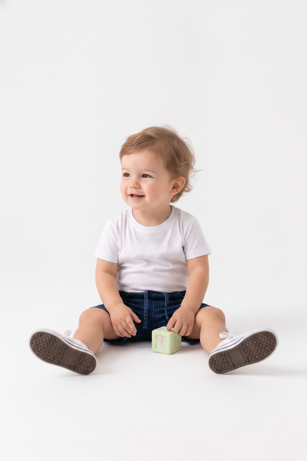 Toddler denim sitting pose